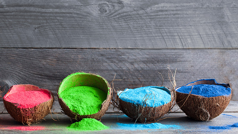 Coconuts filled with colorful powder