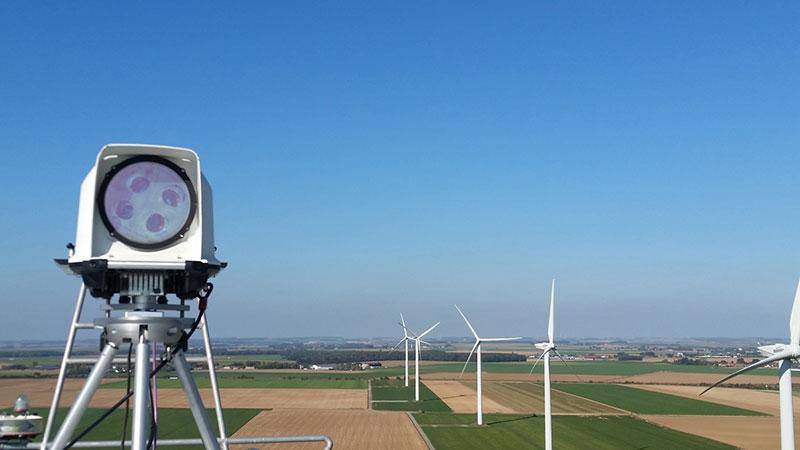 WindCube Nacelle with wind turbines in the background