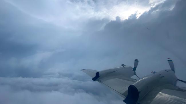 Sun seen over the eye wall of Cat 4 Hurricane Ida from NOAA WP-3D Orion N43RF Miss Piggy during August 29, 2021