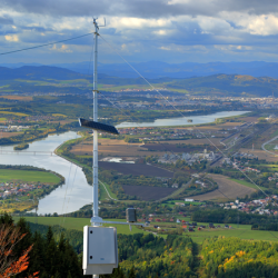 Vaisala Automatic Weather Station AWS810 with nature views in the background.