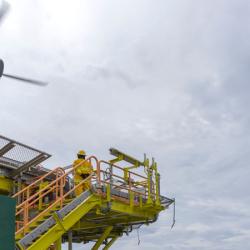 Helicopter landing on oil rig